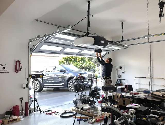 North Haven Garage Door Repair specialist installing smart garage door opener system in North Haven home