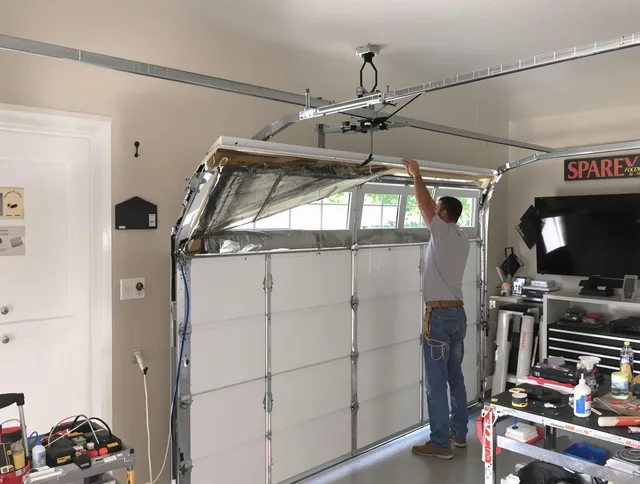 Garage door section replacement by North Haven Garage Door Repair in North Haven