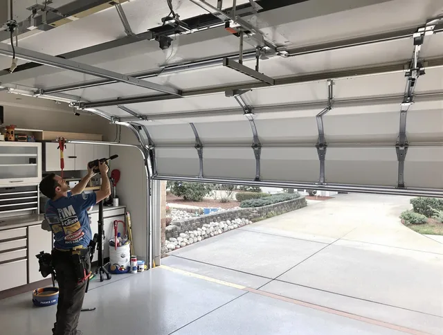 Garage door track repair service by North Haven Garage Door Repair in North Haven